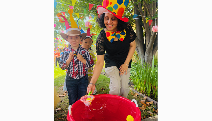 Smiling Challenger student and teacher enjoying Circus Days