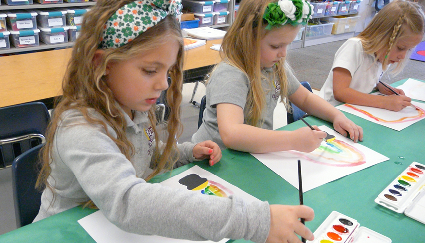 Young Challenger students participating in a St. Patrick’s Day activity